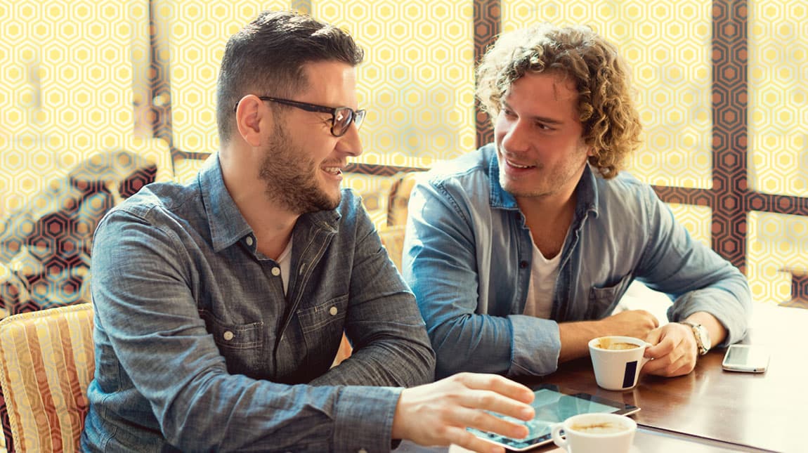 two guys getting coffee