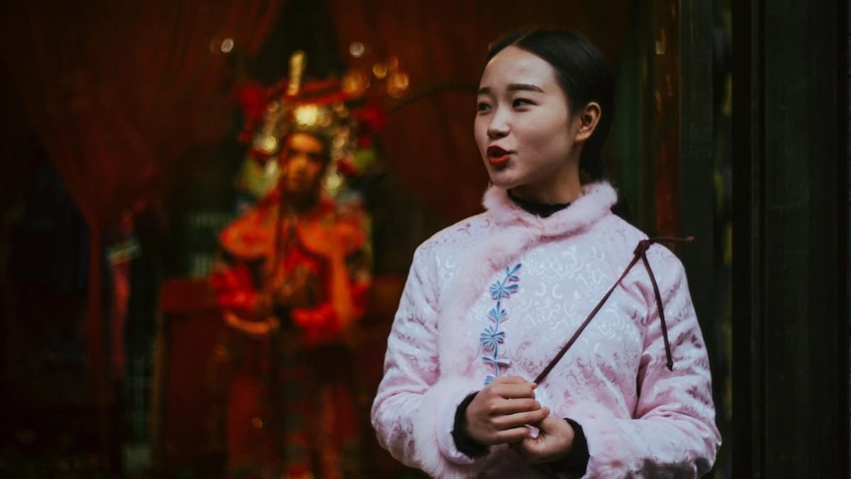 Asian girl in a pink outfit