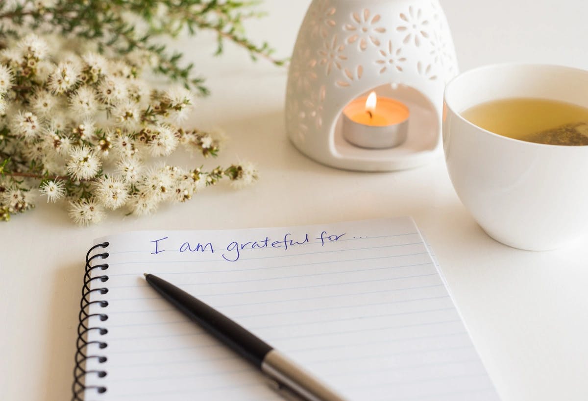 notebook with "I am grateful for" written at the top