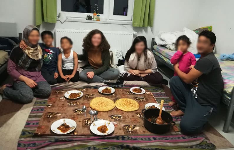 people having dinner together