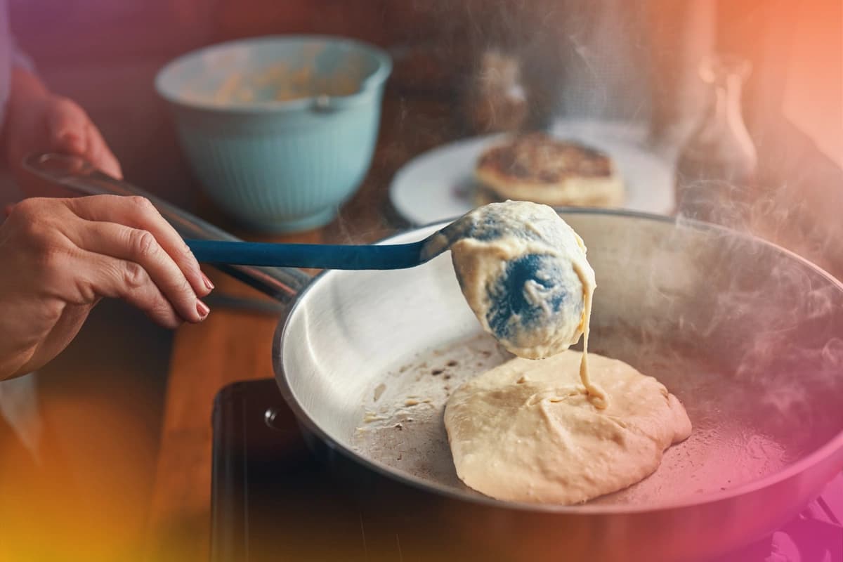 woman making pancakes