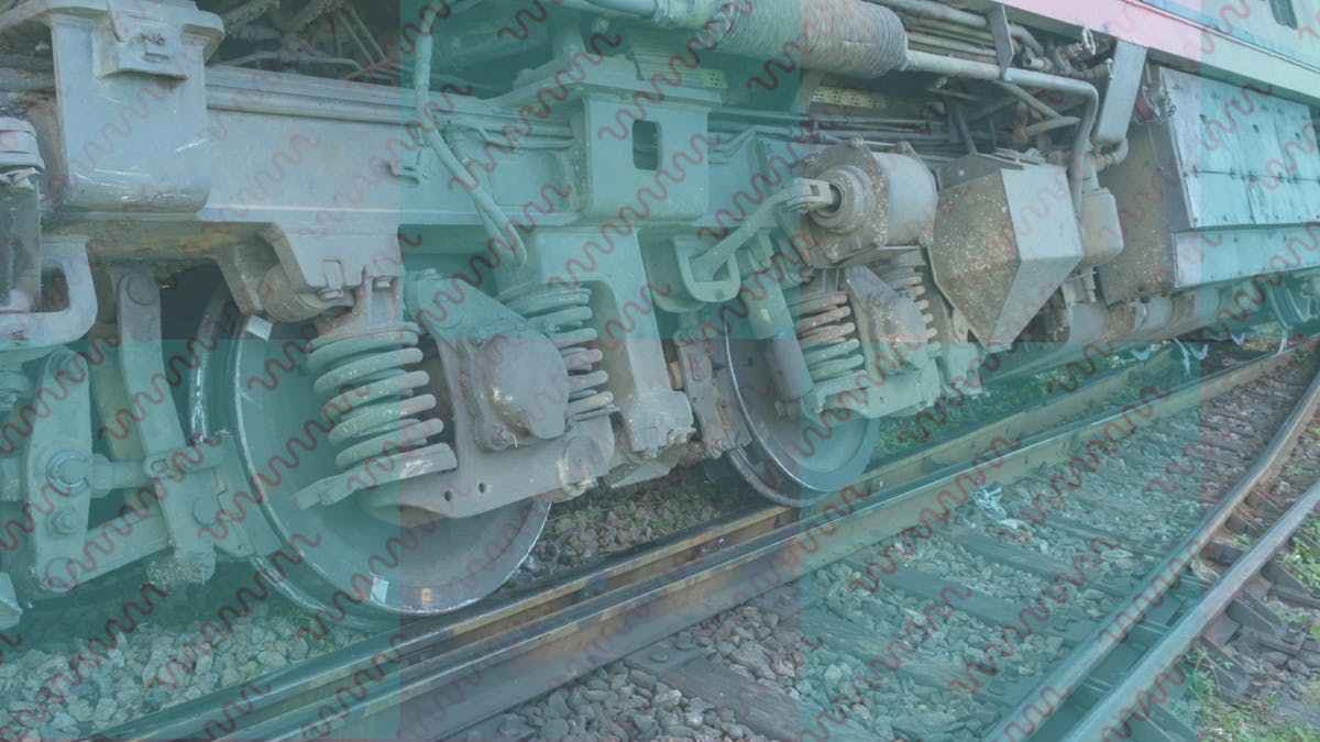 image of train wheels on train tracks